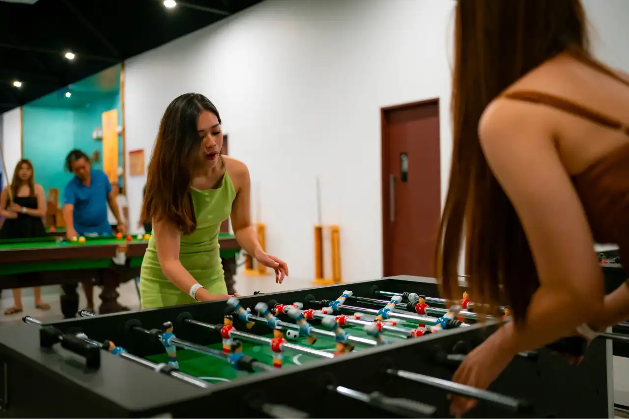 People play table footaball